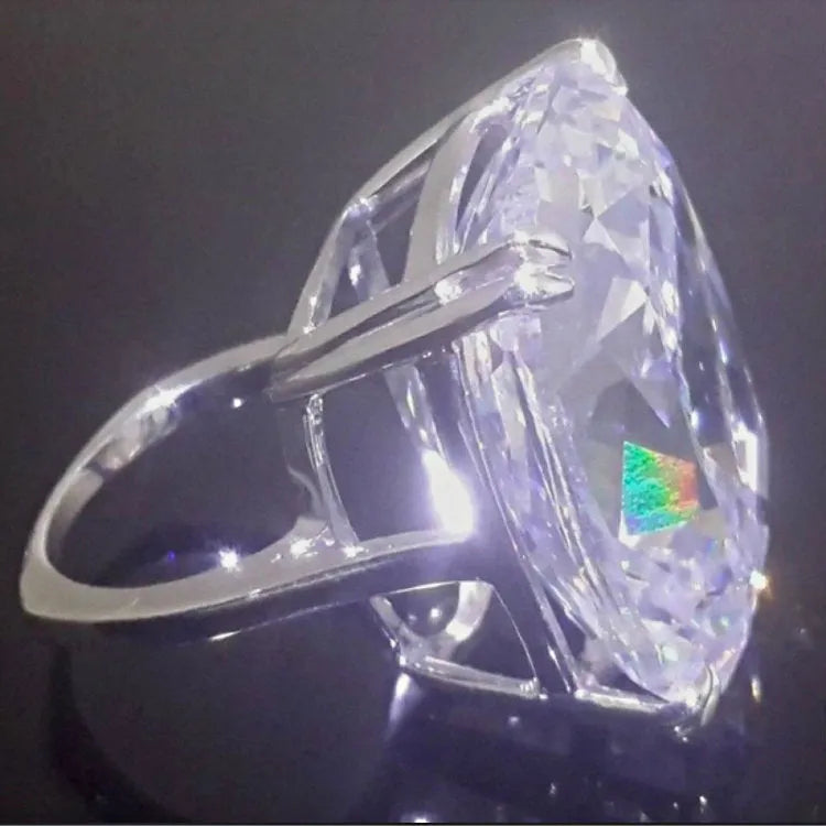 Women's geometric square diamond ring with white gold colour finish on a hand