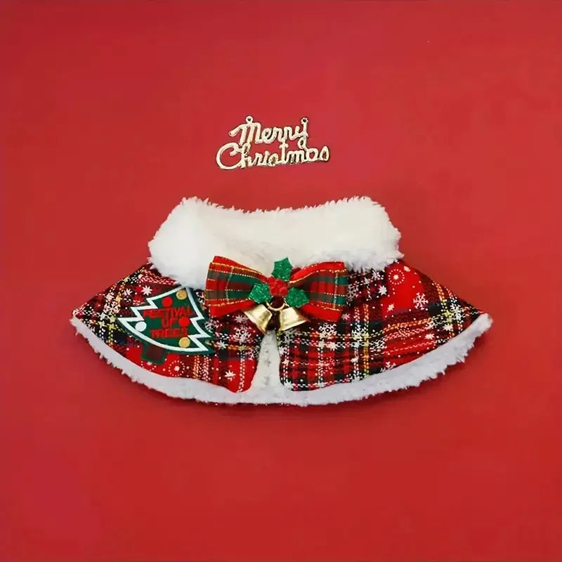 A red festive pet scarf with a bell pattern fastened around a dog's neck with an elastic collar.