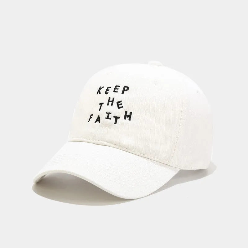 Men's beige cotton baseball cap with adjustable strap and dome crown on a white background.