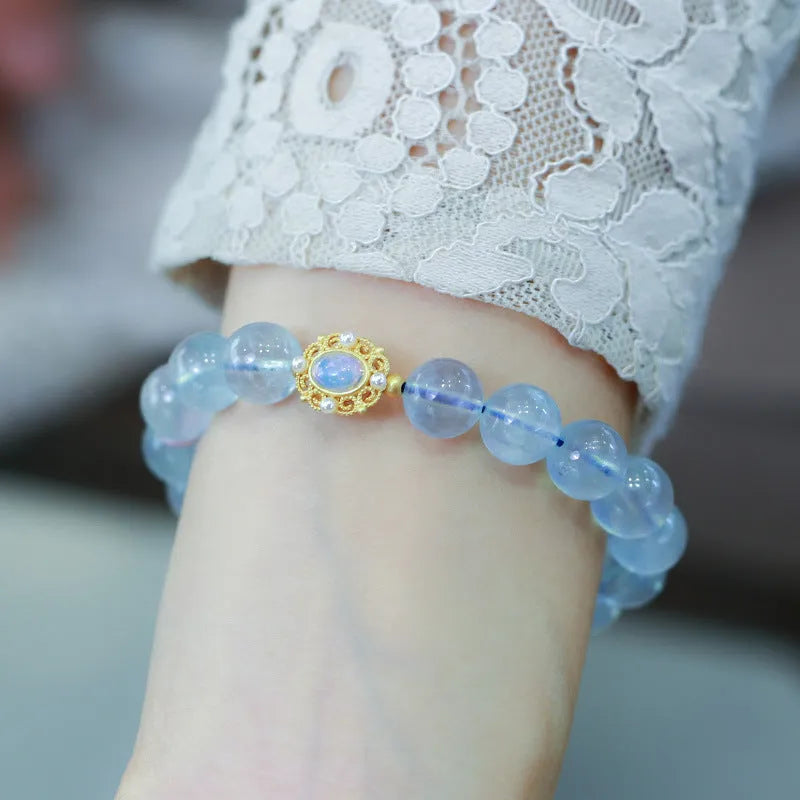 Aquamarine gemstone and components for a DIY Fengjiu Chinese style bracelet kit for women.