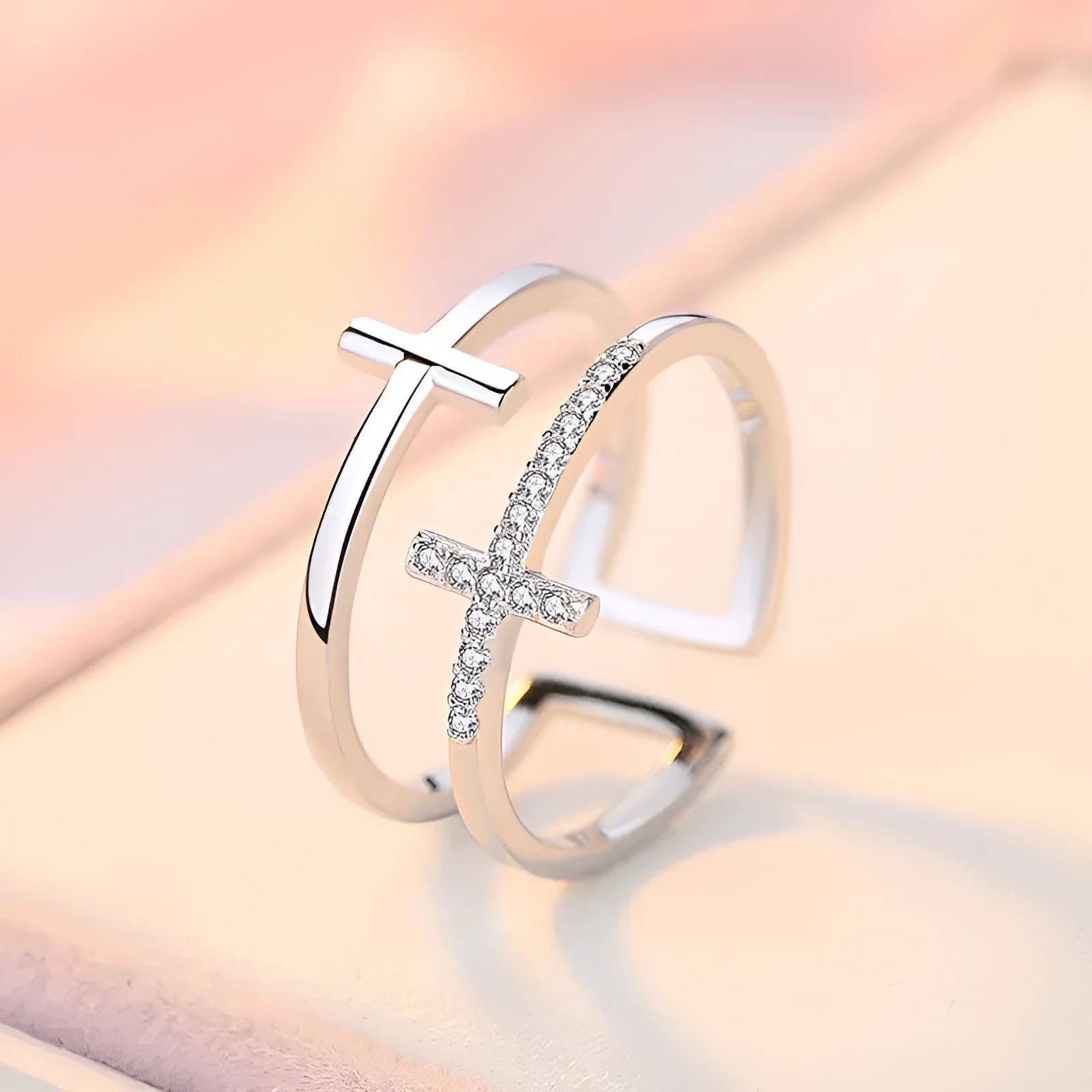 Adjustable copper ring with clear zircon stone in geometric setting, shown in gold electroplated finish