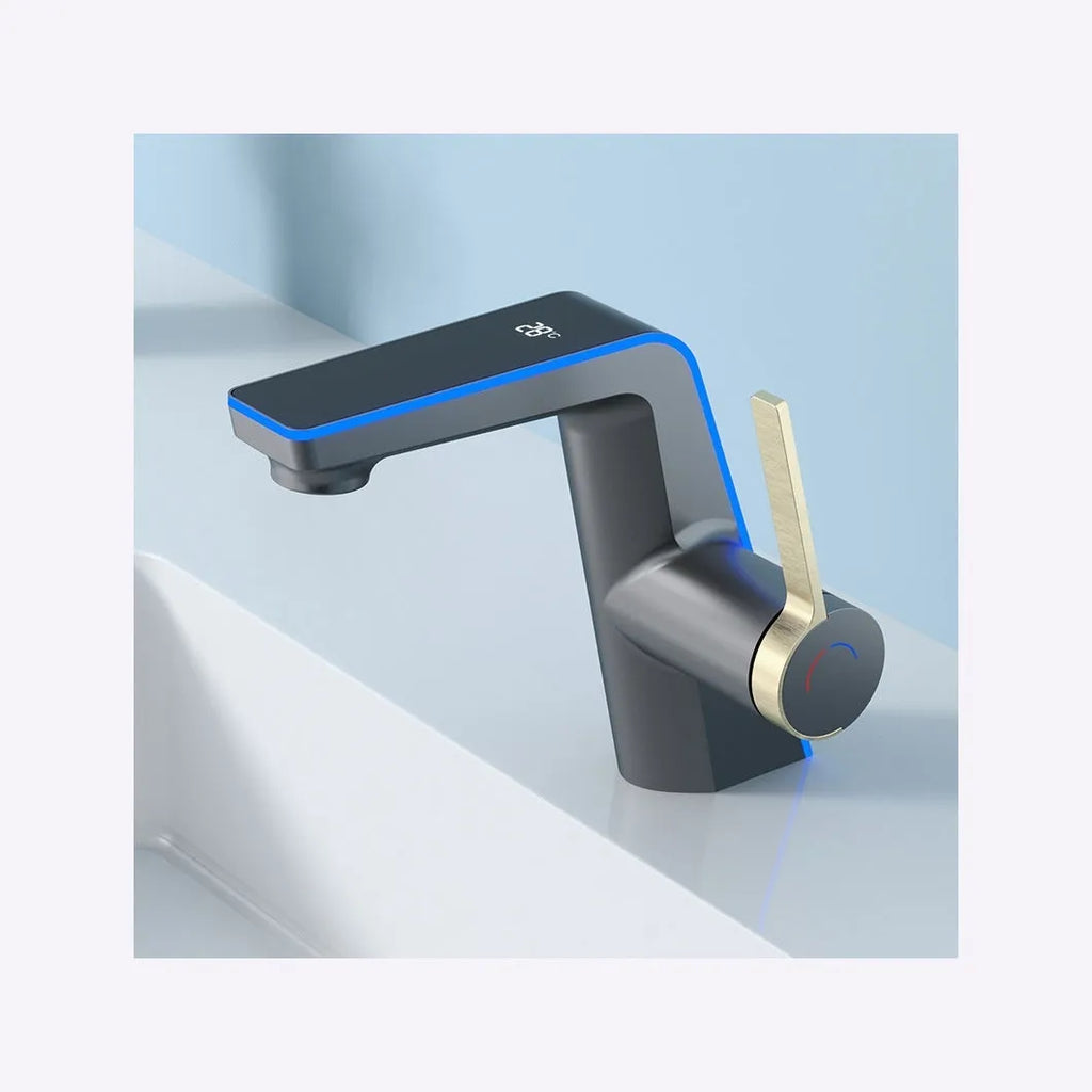 Digital display basin faucet with ambience light in gun gray finish with 80cm inlet pipe on a modern bathroom sink