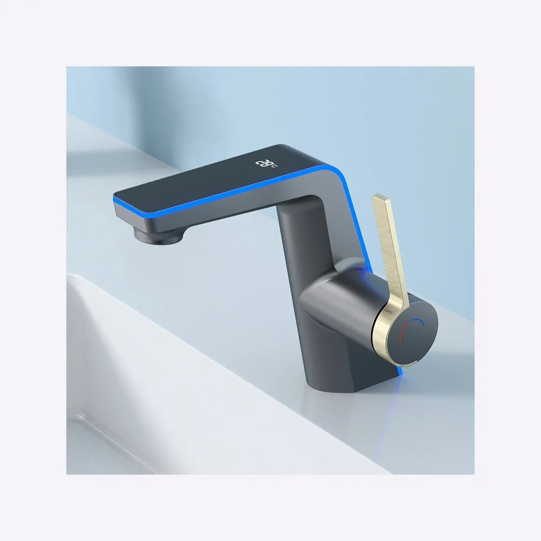 Digital display basin faucet with ambience light in gun gray finish with 80cm inlet pipe on a modern bathroom sink