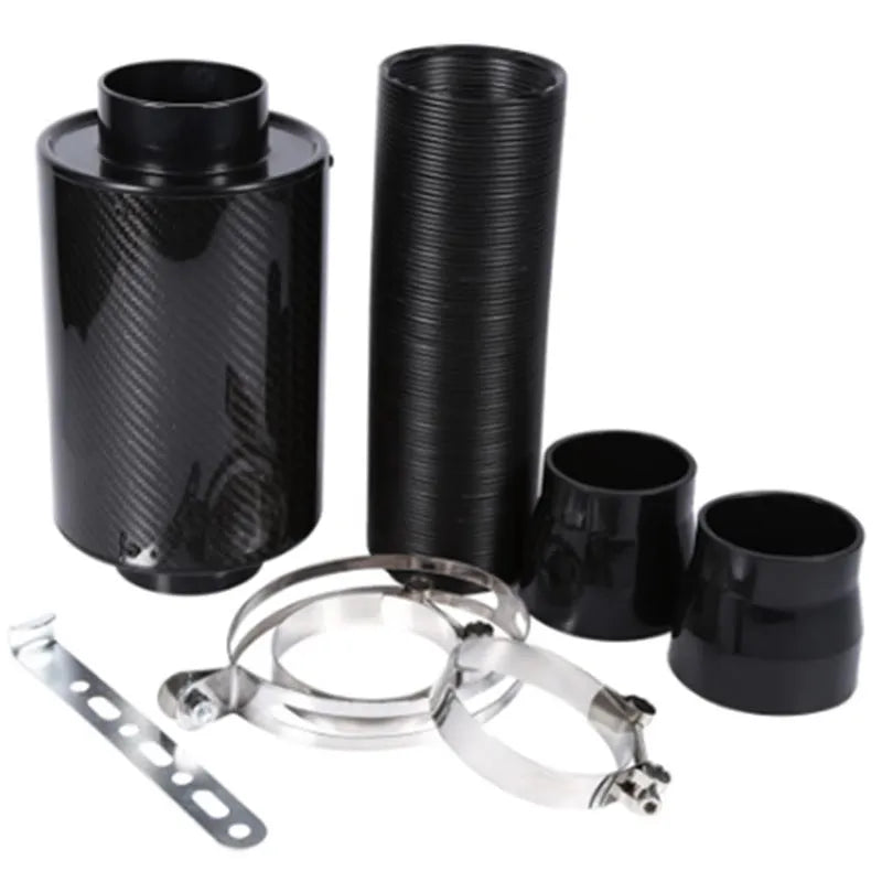 Car modification turbo high flow air box kit in black carbon fibre with stainless steel clamps on a workbench