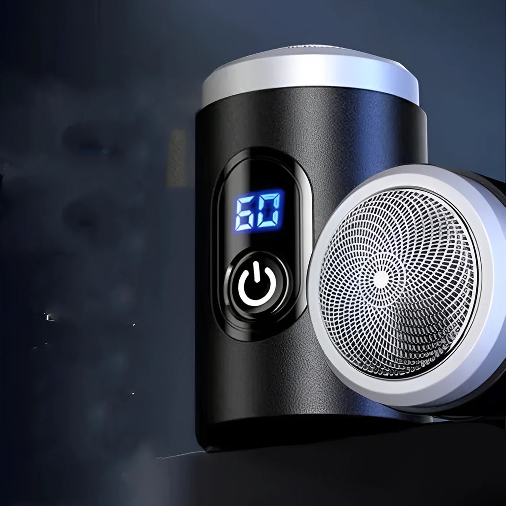 Black mini portable electric shaver with USB charging cable and cleaning brush.