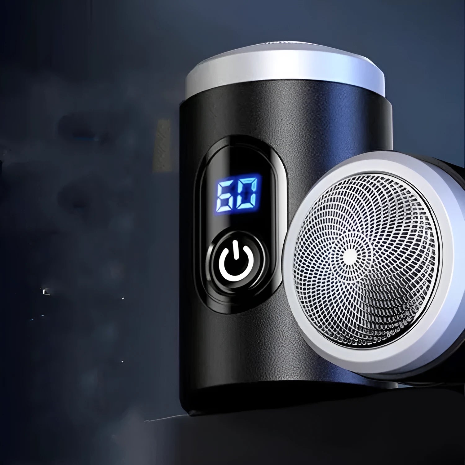 Black mini portable electric shaver with USB charging cable and cleaning brush.