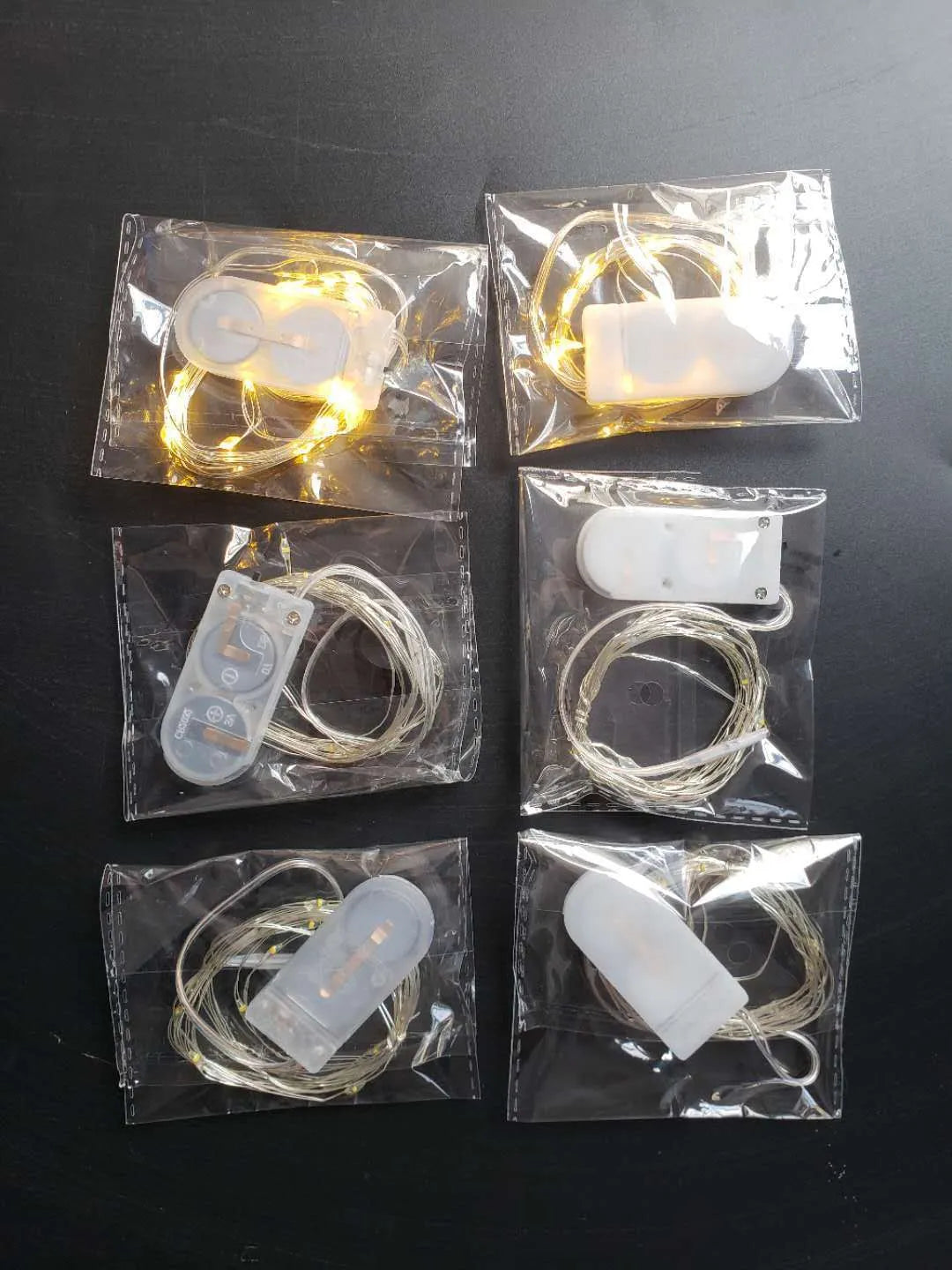 LED copper wire fairy lights with battery box showing flexible string arrangement
