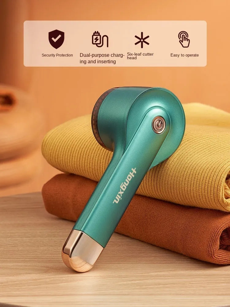 USB rechargeable hair ball trimmer with stainless steel cutting net on an ABS plastic body.