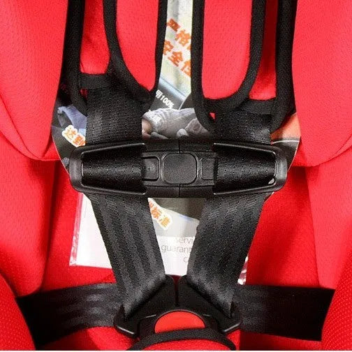 Black nylon seat belt buckle clip for child car seat 5-point harness.