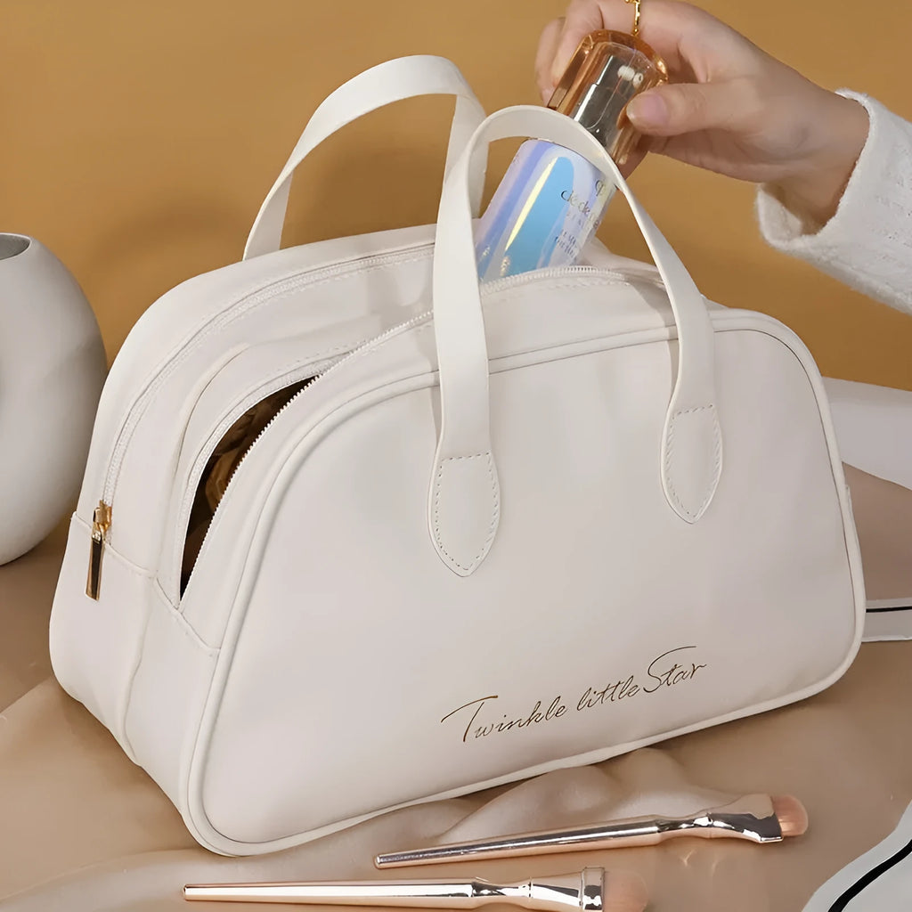 PU leather travel toiletry bag in classic black colour, showing large capacity and zipped compartments.