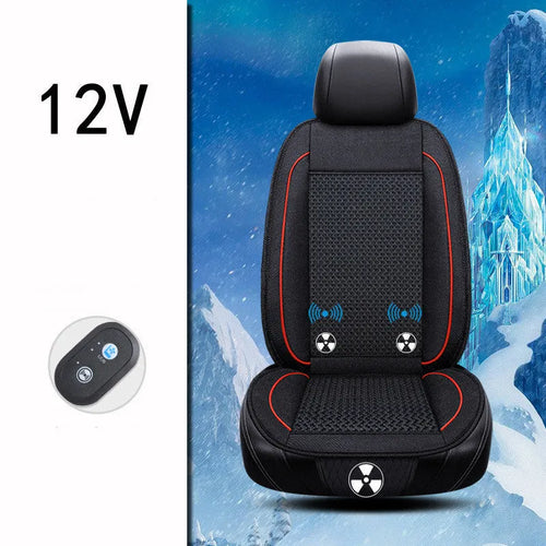 Black car ventilation seat cushion with power cord, shown on a car seat
