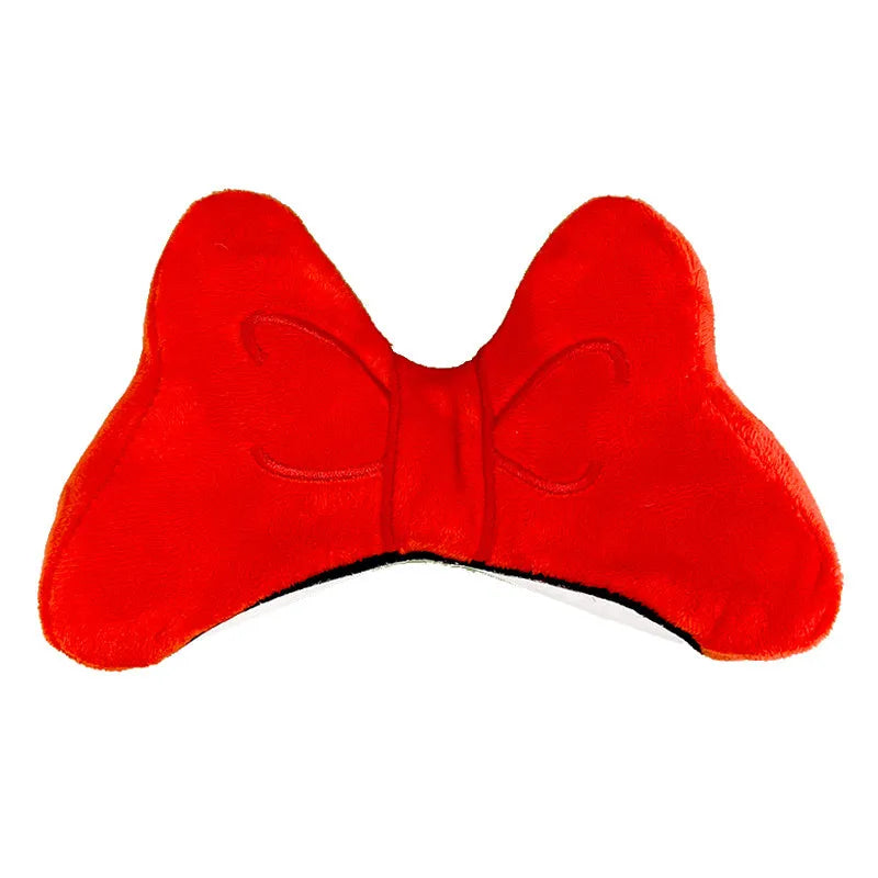 Soft plush hair-tie bow decoration for helmets in red, peach pink and rose pink.