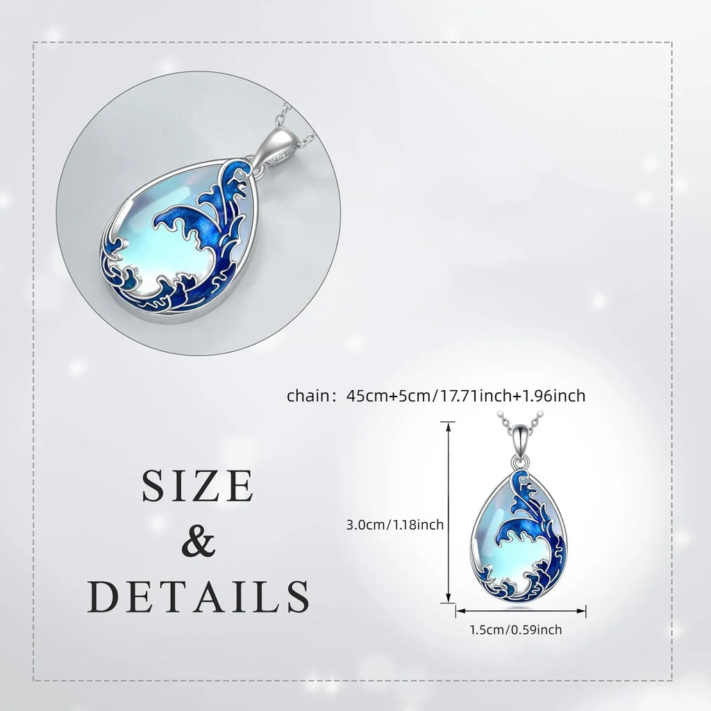 Close-up of a moonstone blue heart-shaped alloy pendant on a women's necklace.