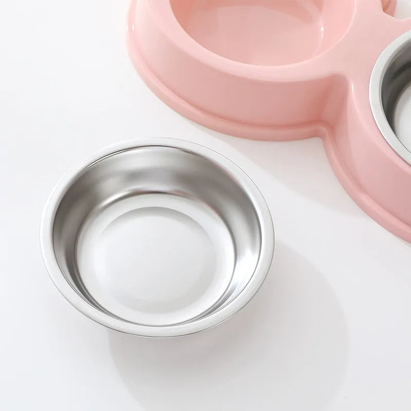 Stainless steel double pet bowl for food and water with a coloured silicone anti-slip base.