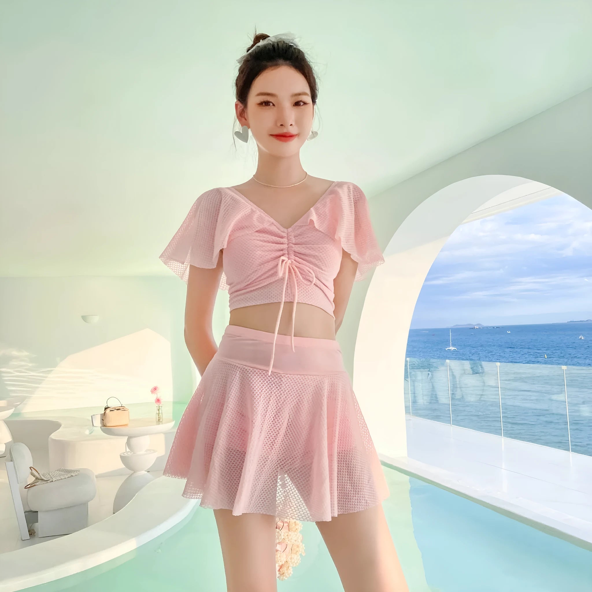 Women's solid colour two-piece skirt swimsuit in polyester and spandex fabric