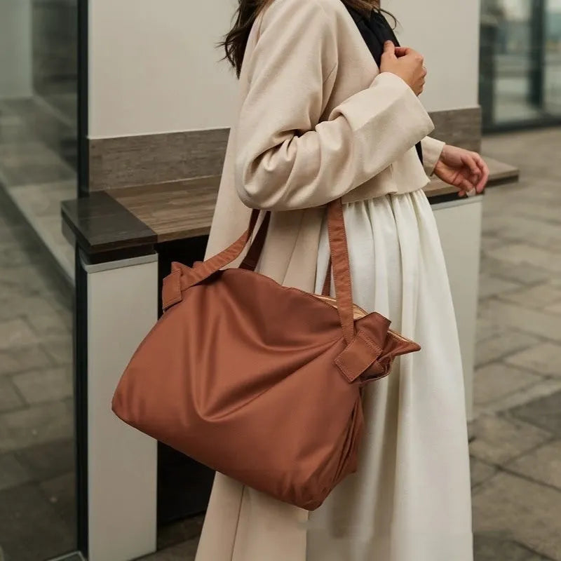 Women's Oxford cloth shoulder crossbody luggage bag in black or light brown with large capacity storage