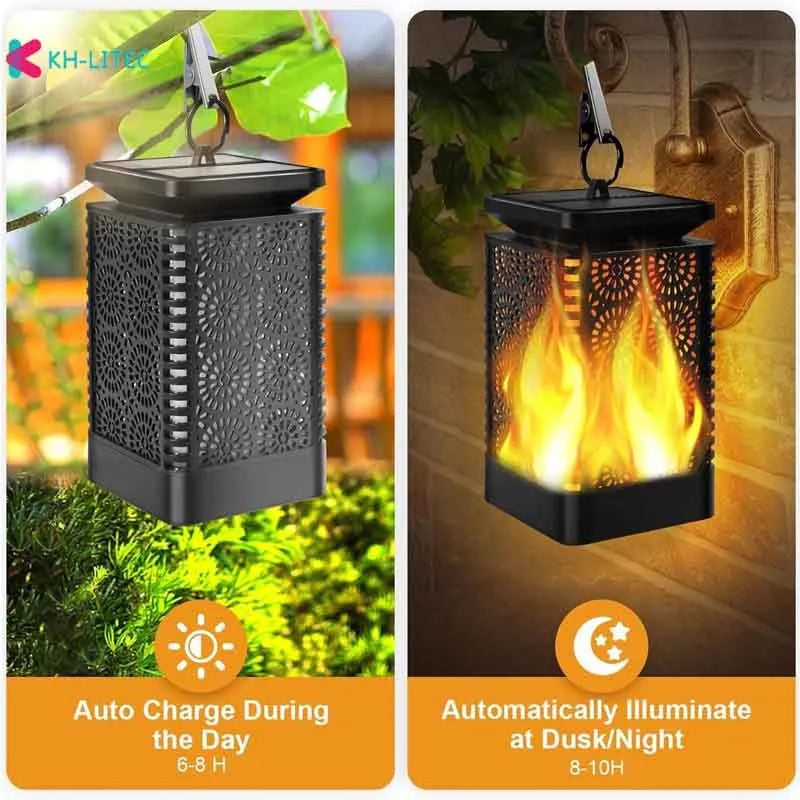 Set of four black solar-powered flame effect LED lanterns for outdoor garden decoration.
