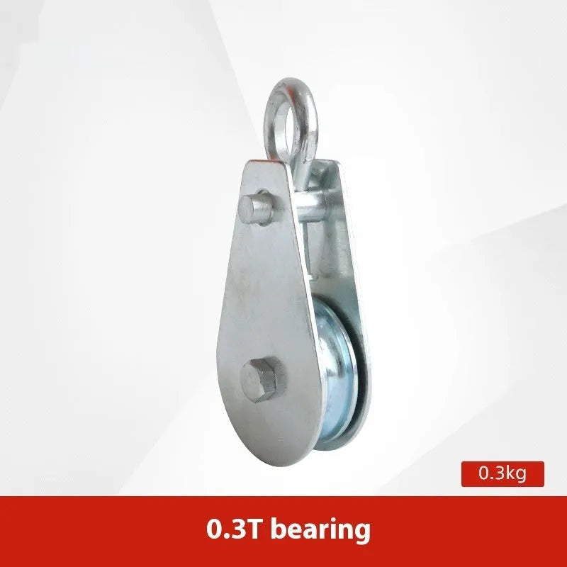 Red industrial lifting pulley with a forged steel safety latch hook and wire rope wheel.