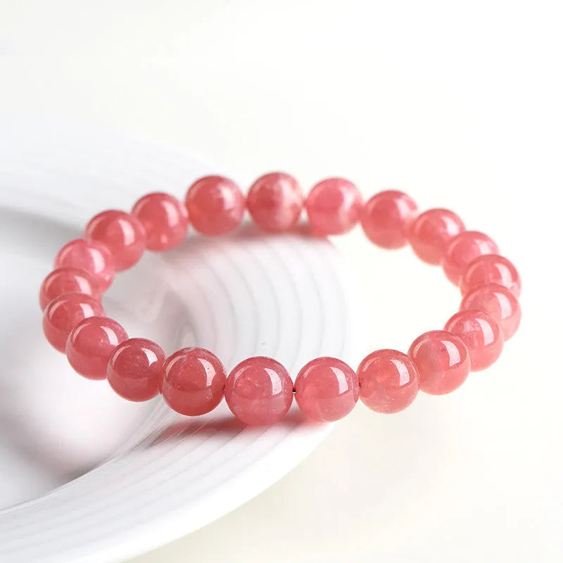 Geometric crystal bracelet with longevity lock closure in rhodochrosite colour variations