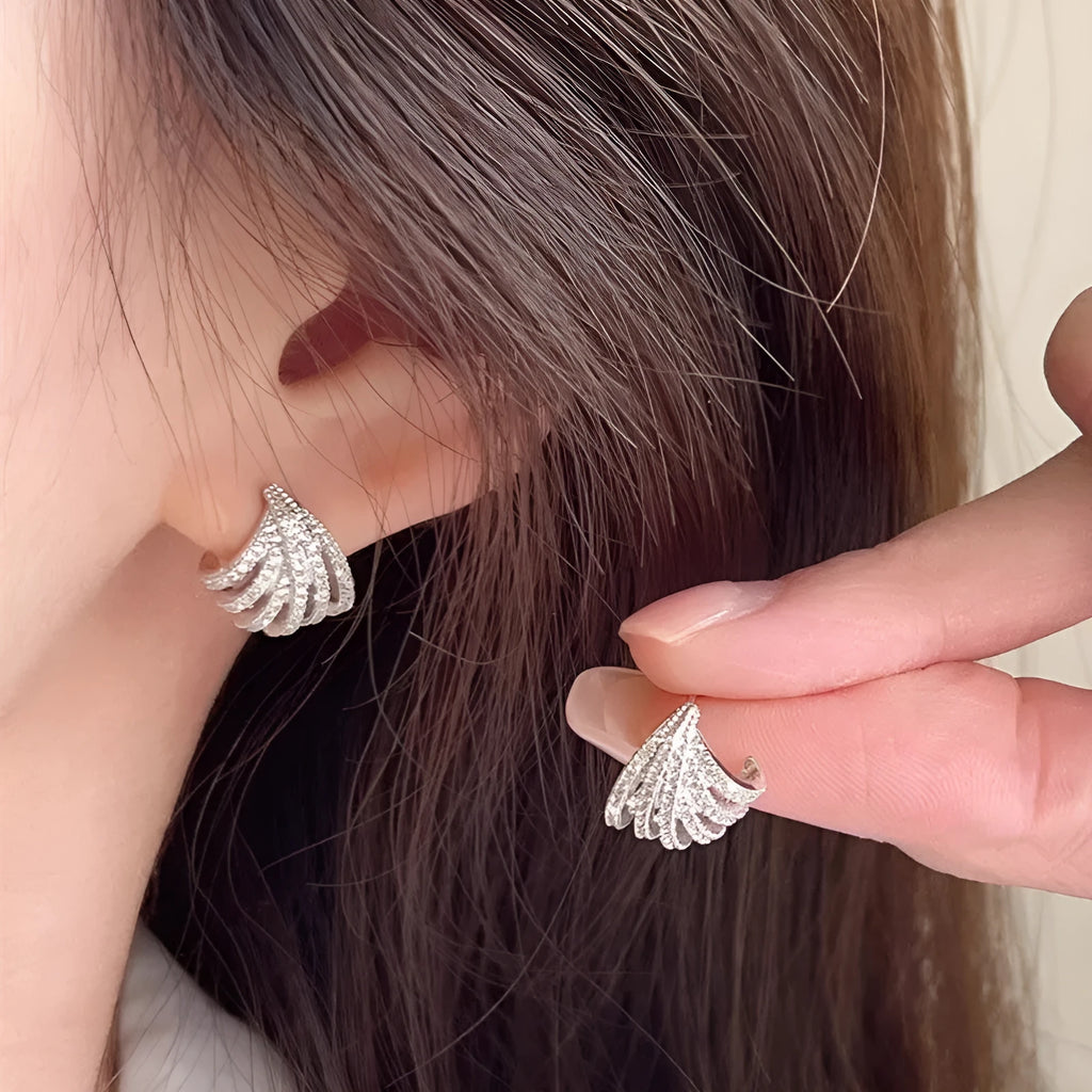 Women's geometric earrings in platinum colour with zircon construction and electroplated finish