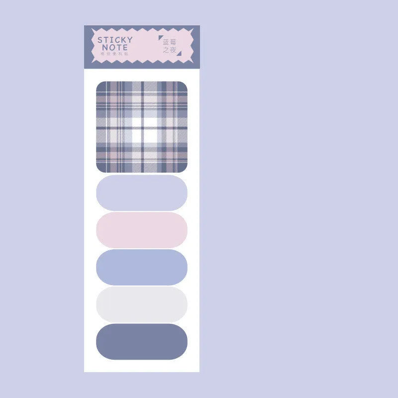 Set of colourful sticky note memo pads in eight designs including plaid and solid colours.
