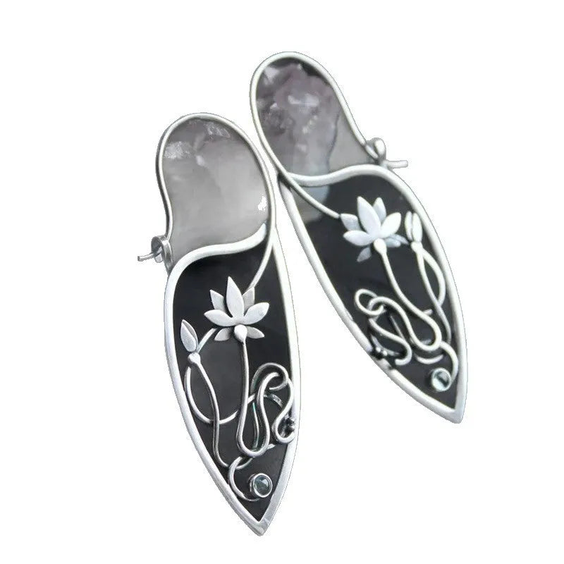Silver women's earrings with lotus vine design featuring geometric floral patterns and circular rhinestones