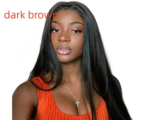 Long straight black synthetic wig with centre-parted bangs on display