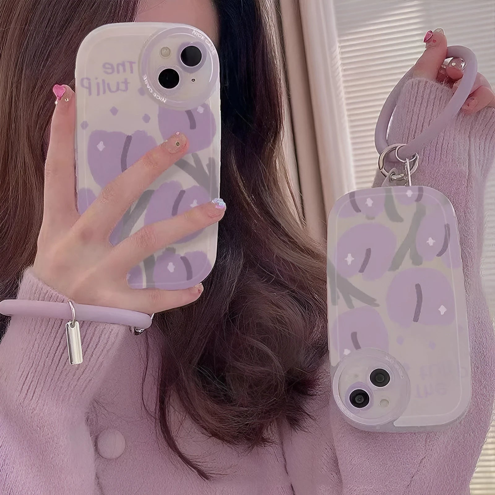 Purple transparent iPhone case with ring holder and tulip heart pattern, includes matching wrist strap
