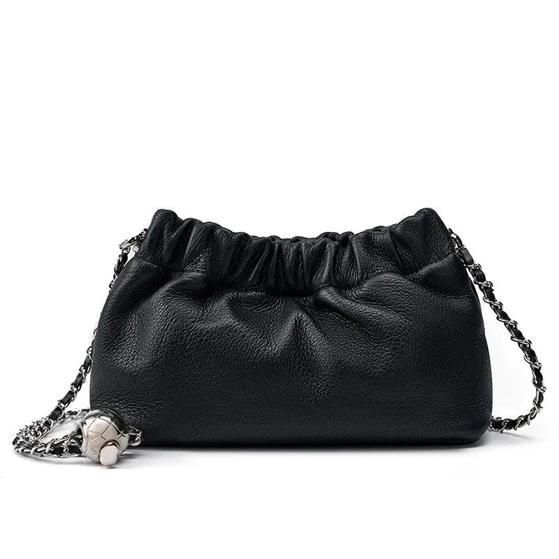 Women's soft cowhide leather crossbody bag in dumpling shape with a single strap.