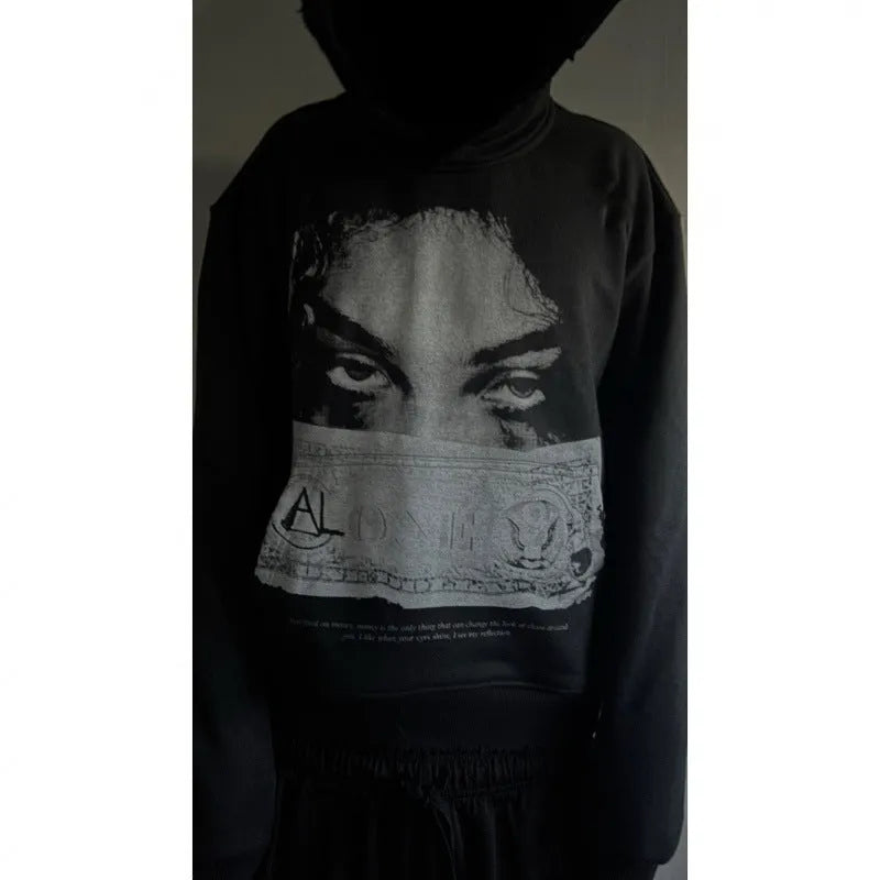 Black women's hoodie with cartoon pattern print, loose fit design
