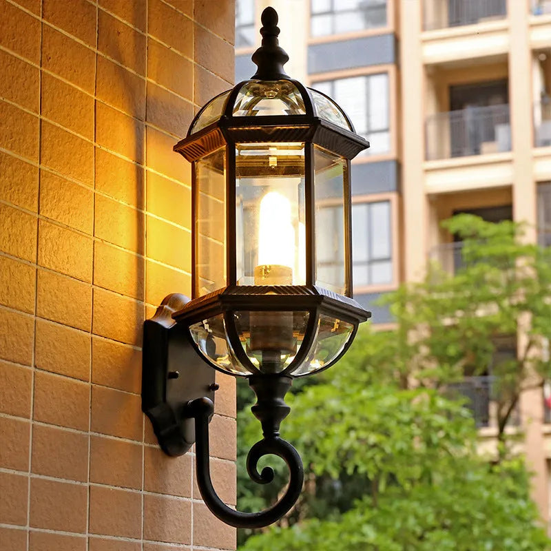Gold aluminium outdoor waterproof wall lamp with a three-layer eight-inch frame mounted on a wall.
