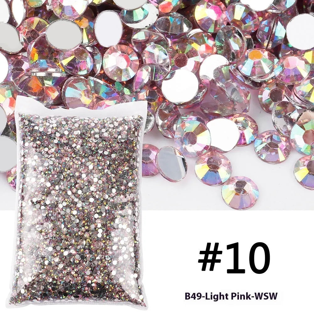 Plastic resin nail art rhinestones in multiple colours with electroplated surfaces arranged in mesh packaging