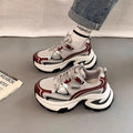 Women's silver platform sneakers with mesh lining and rubber sole