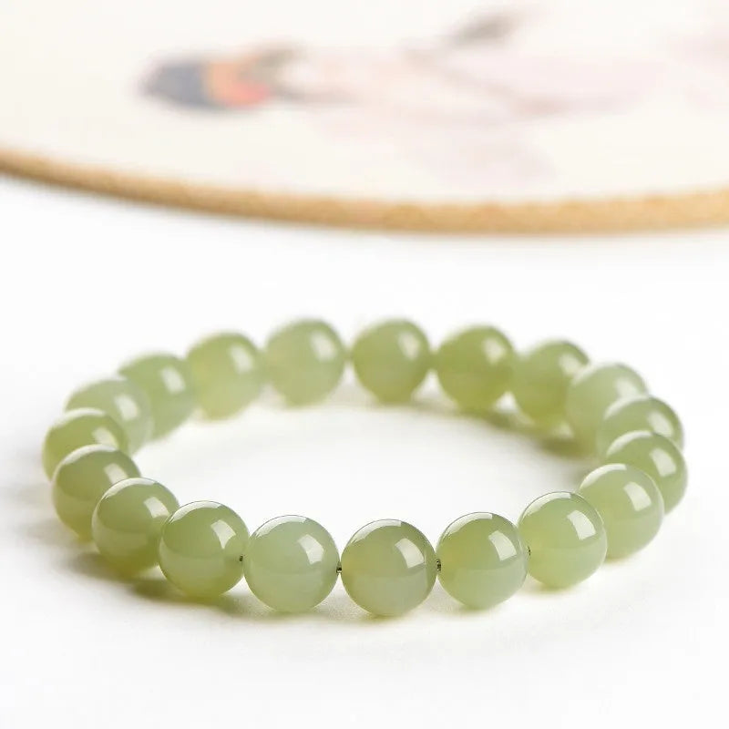 Hetian jade bracelet with polished round beads in ice-like clear colours, 4mm to 10mm sizes, unisex style