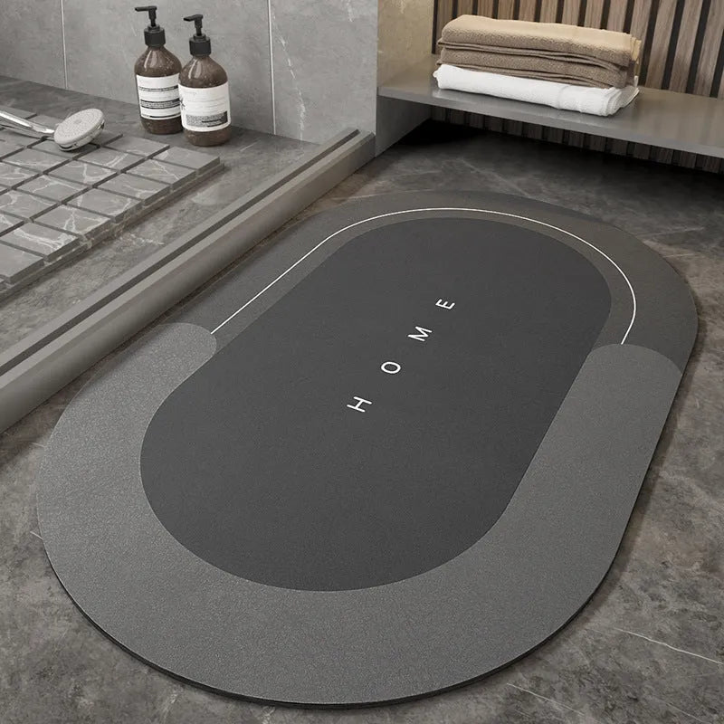 Blended fabric bathroom floor mat in blue, available in oval and rectangular shapes.