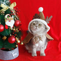 Red polar fleece Christmas cloak with hood for dog or cat wearing antler pattern design.