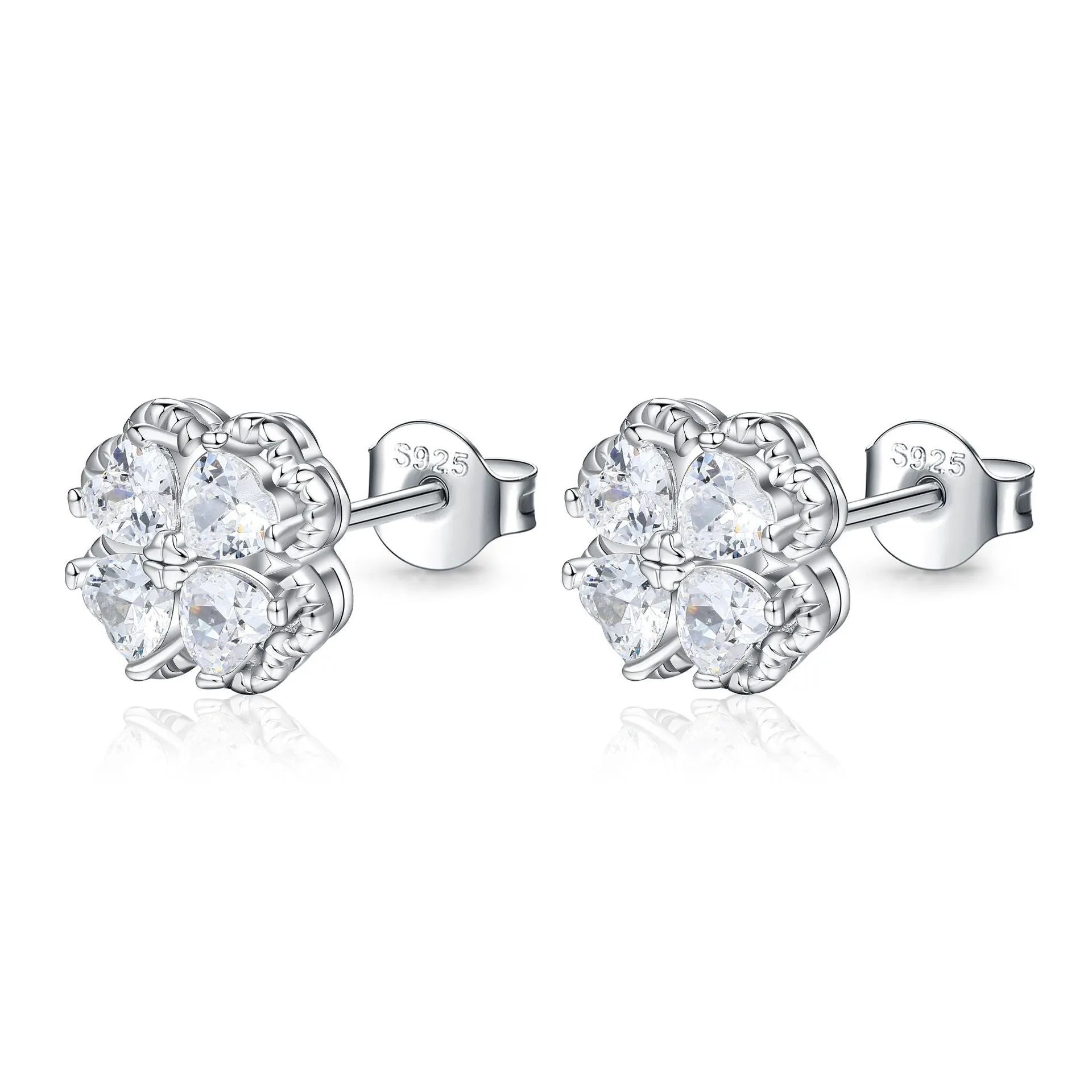 Pair of heart-shaped zircon earrings in 925 silver with a white gold finish.