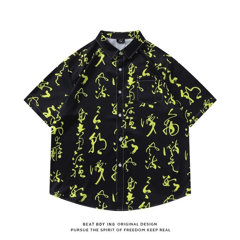 Loose fit short sleeve cardigan shirt with a colourful floral print pattern.