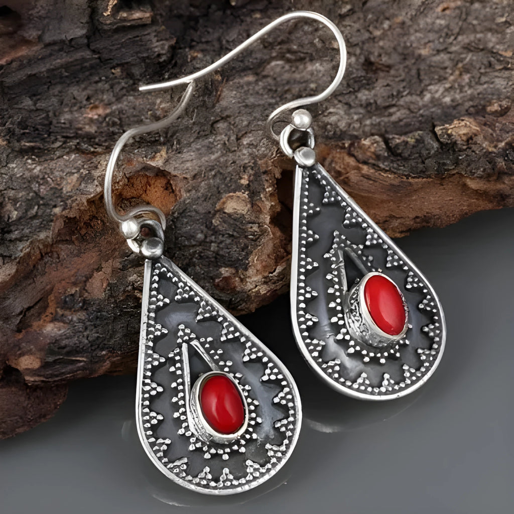 Silver drop earrings with red pine gemstone detail in European style