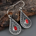 Silver drop earrings with red pine gemstone detail in European style