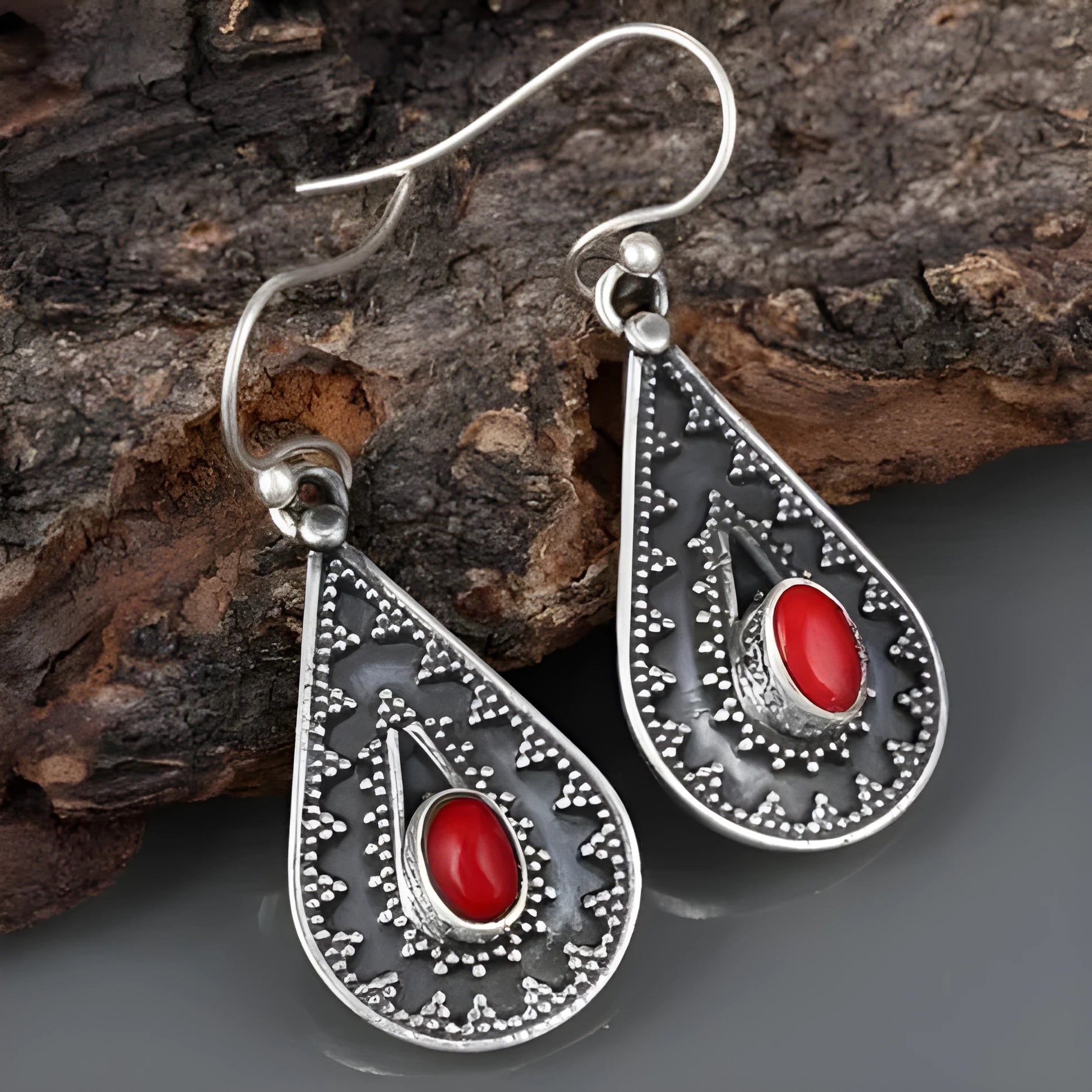 Silver drop earrings with red pine gemstone detail in European style