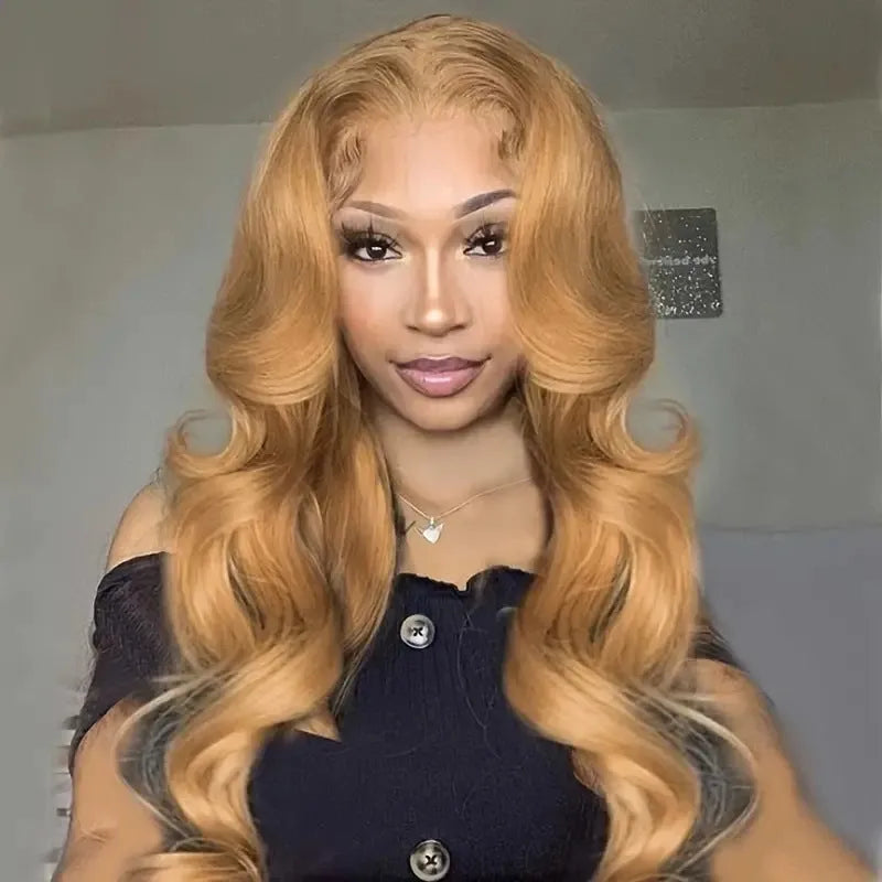 Light brown long synthetic curly wig with big waves and side bangs shown at medium length