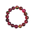 Women's watermelon crystal bracelet showing pastoral design elements on wrist