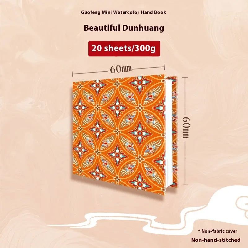 Feiluniao handmade fabric watercolour notebook with illustrated cover, open to show blank paper pages.