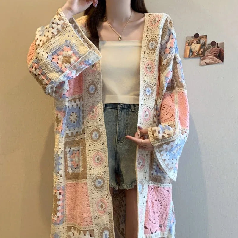 Loose crocheted hollow out sweater coat cardigan with geometric pattern in Lotus Root colour, polyester fibre, medium length 65cm