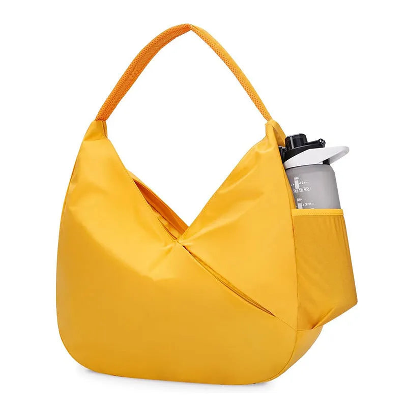 Women's cylindrical nylon fitness handbag with chain and lock detail in light green colour