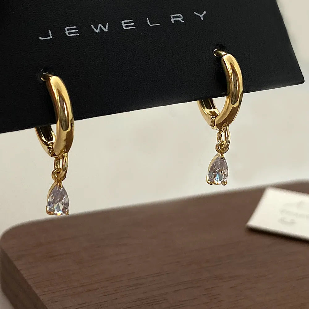 Silver-tone zircon jewellery set with geometric meteor shower pendant necklace, matching earrings and anklet