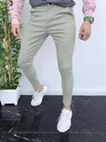 Men's slim-fit straight-leg trousers with a grey and black 3D printed plaid pattern.