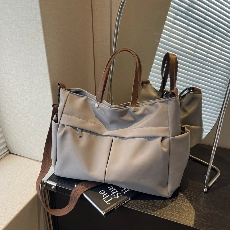 Nylon crossbody tote bag for women in black, grey, milky white, or green colours