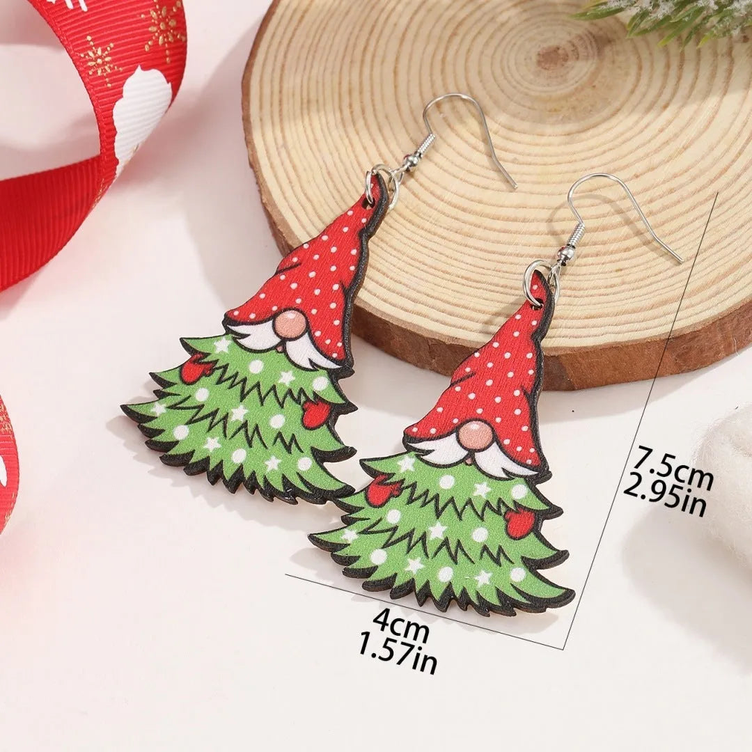 Wooden Christmas earrings with printed tree and snowman designs on geometric shapes